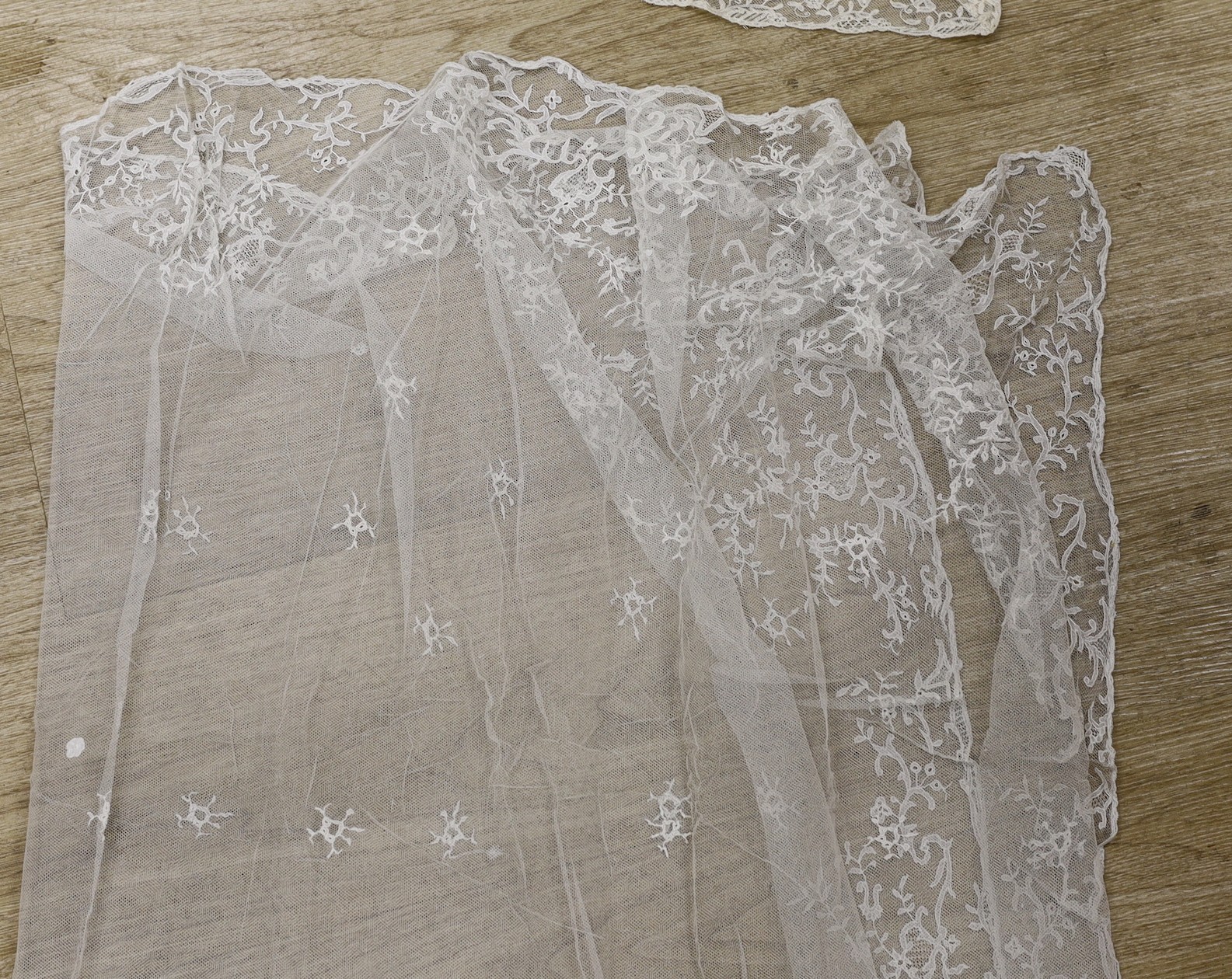 A late 19th century Carrickmacross wedding veil and an Irish needle run stole